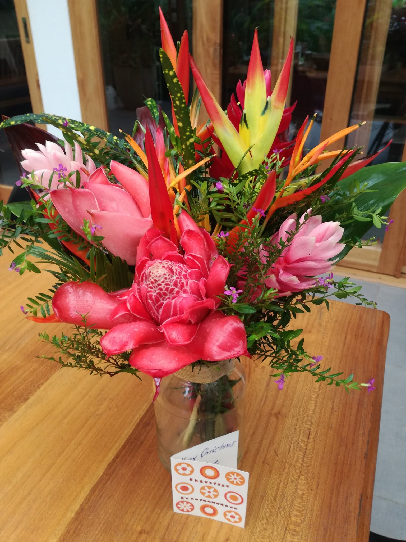 Large tropical bouquet with heliconia, ginger and pink flowers