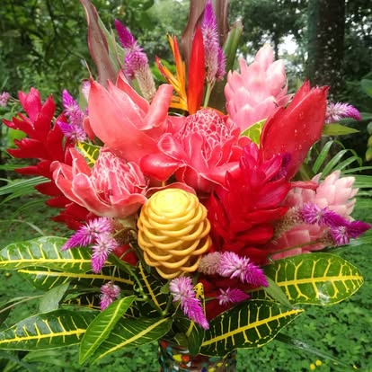Vibrant flower crown with orchids and heliconia
